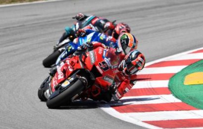 Petrucci survives rubbery brush with Rins for podium