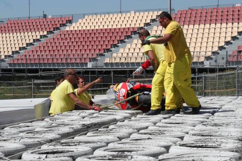 PIC: Lorenzo's bike on the barrier after test fall PIC: Lorenzo's bike on the barrier after test fall