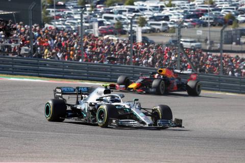 Bottas makes late pass for US GP victory as Hamilton clinches title
