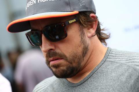 Fernando Alonso 'available' to help Renault after completing F1 seat fit
