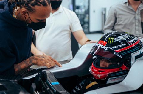 Hamilton helps out Russell at Mercedes F1 seat fitting Hamilton helps out Russell at Mercedes F1 seat fitting