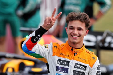 Lando Norris’ agent pictured in discussion with Red Bull’s Helmut Marko