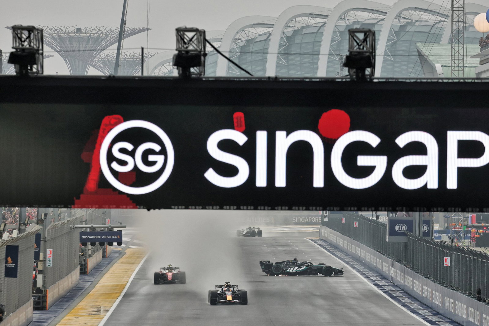 George Russell crashes out of lead of Singapore GP sprint George Russell crashes out of lead of Singapore GP sprint